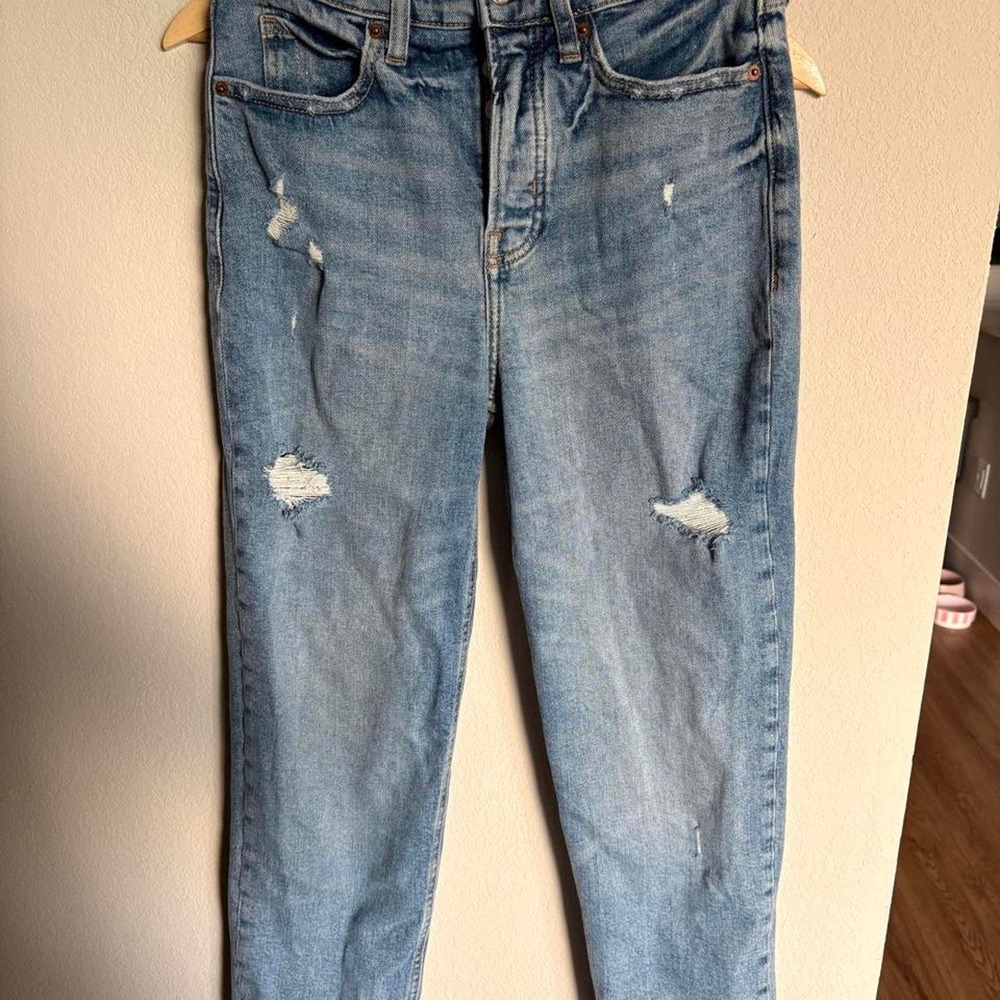 Old Navy blue denim jeans with a distressed look, size 2. High waisted, straight